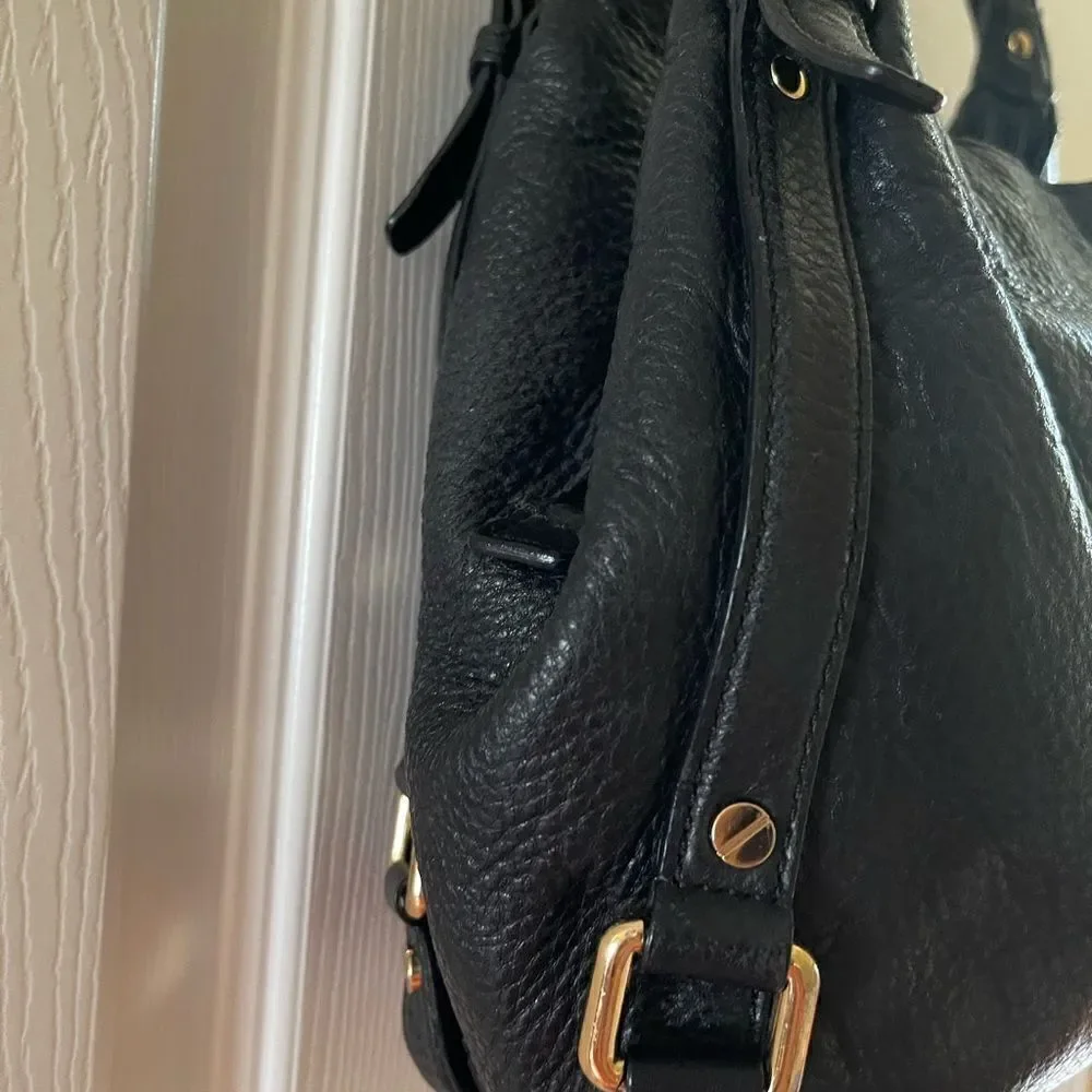 Michael Kors Black Pebble Leather Satchel with gold tone hardwares and accents.